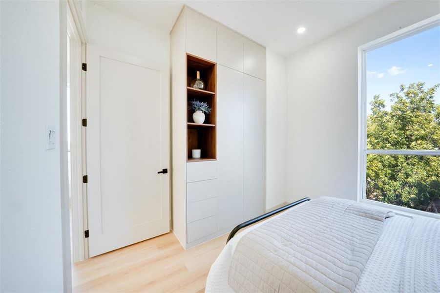 Bedroom with light wood-type flooring