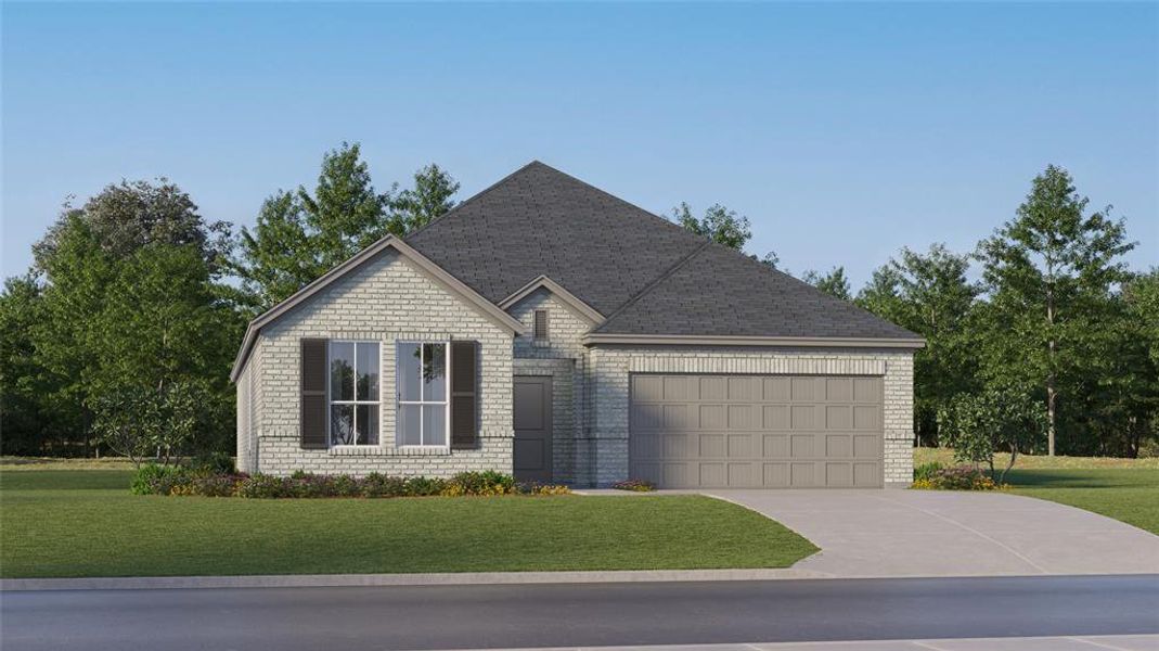 View of front facade featuring a front yard and a garage