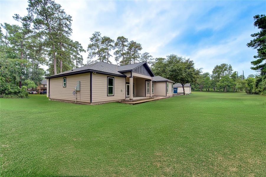 Rear view of home, grass is simulated