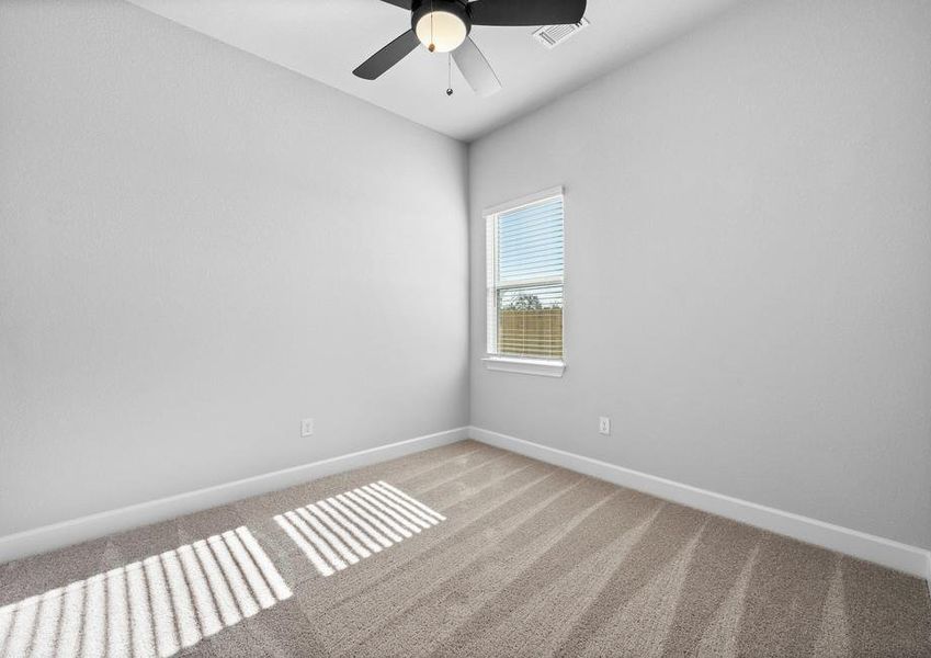 <p>Spacious secondary bedroom with natural light. </p>