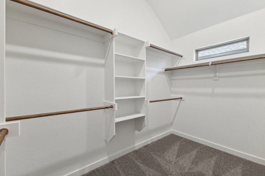 Primary closet in the Quartz home plan by Trophy Signature Homes – REPRESENTATIVE PHOTO