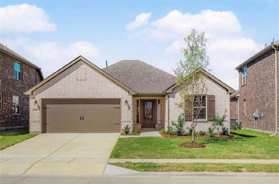 Front Elevation of home with a garage and a front yard