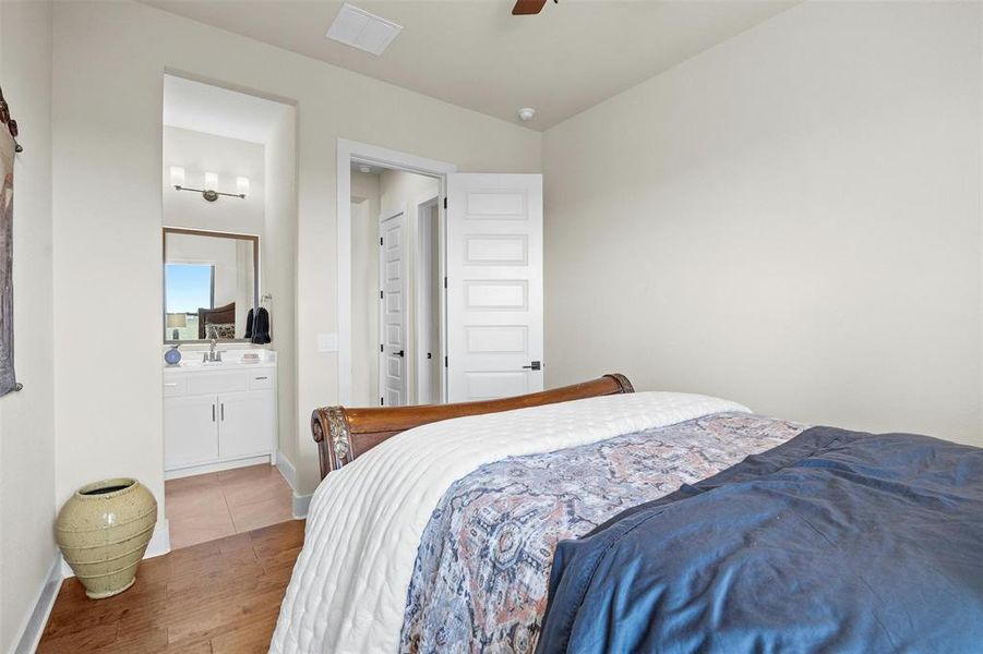 Guest bedroom 2 with opening to Jack and Jill bathroom.