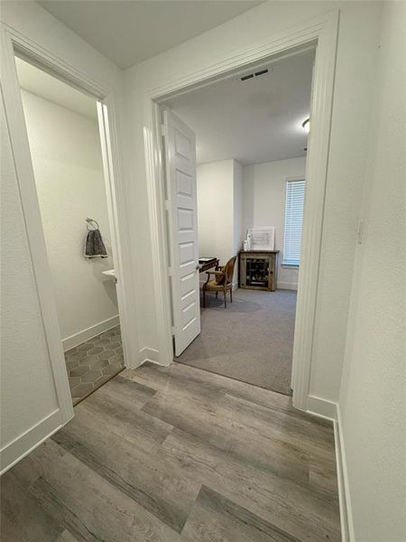 Corridor with wood-type flooring