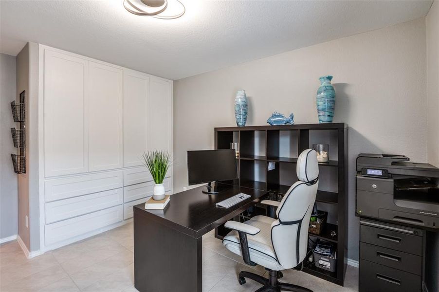 Bedroom 3 is currently being used as a home office. This room also has the custom closet with built in drawers maximizing the space!