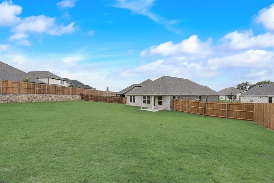 View of yard featuring a patio