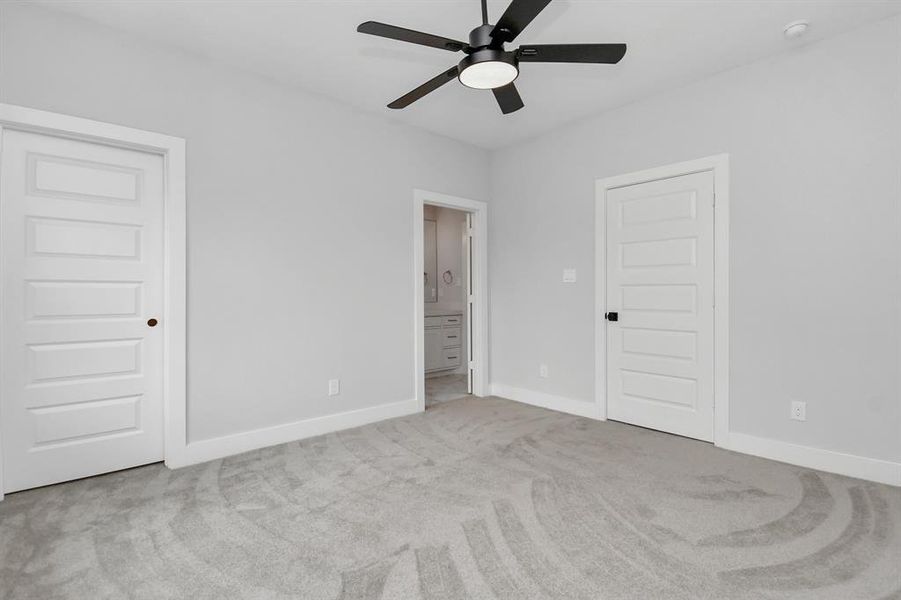 Here is another view of this secondary bedroom - sleek design finishes and a calming color palette make this a room you're sure to love!