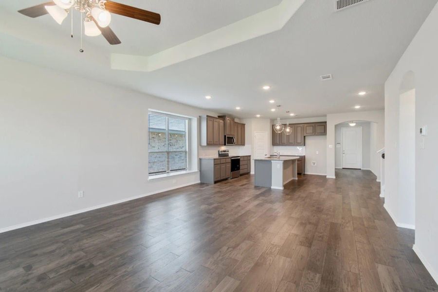 Family Room to Kitchen | Concept 2870 at Silo Mills - Select Series in Joshua, TX by Landsea Homes