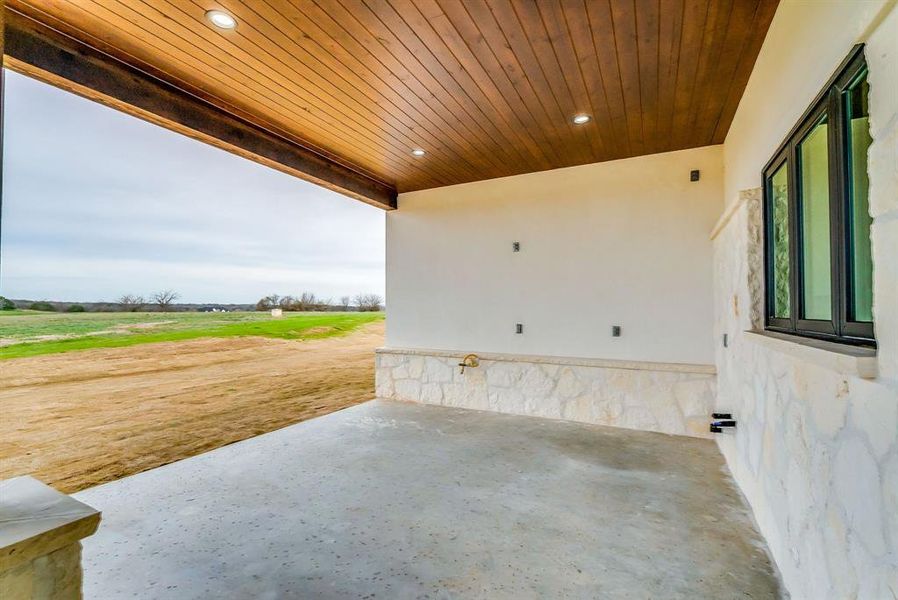 View of patio with a rural view