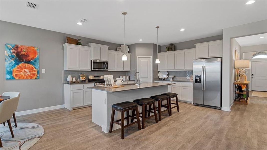 Kitchen - All Home and community information, including pricing, included features, terms, availability and amenities, are subject to change at any time without notice or obligation. All Drawings, pictures, photographs, video, square footages, floor plans, elevations, features, colors and sizes are approximate for illustration purposes only and will vary from the homes as built.