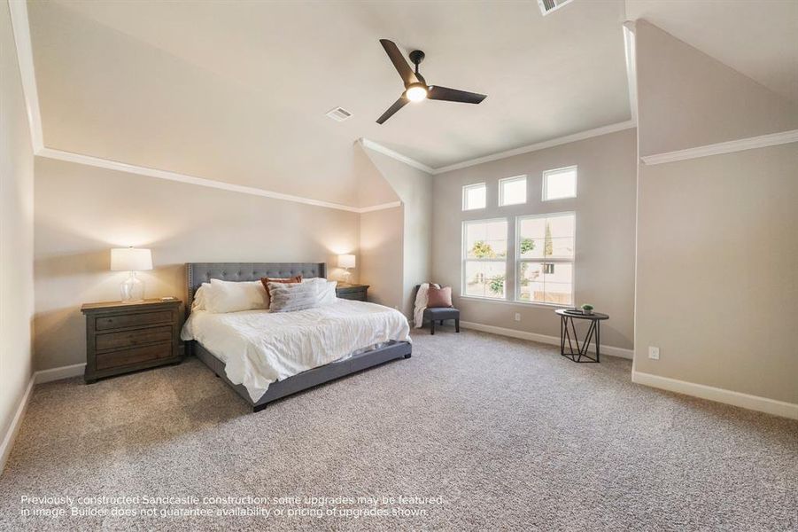 Primary Retreat: A spaciously lit sanctuary, complete with a ceiling fan for personalized comfort and views that take in Houston's scenic downtown facade. (Note: different elevation shown; schedule a viewing to see the the fabulous corner-window configuration in person).