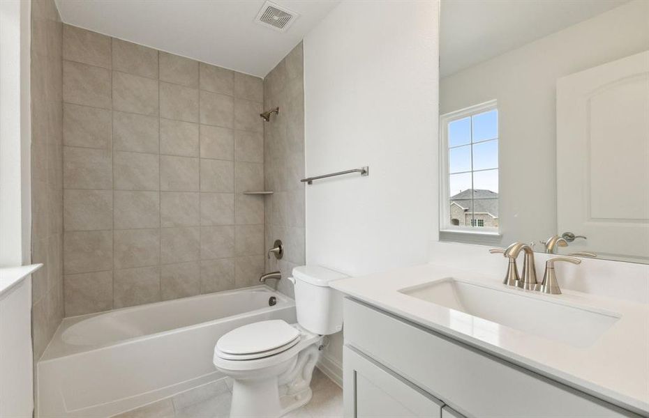 Upgraded secondary bathroom *real home pictured