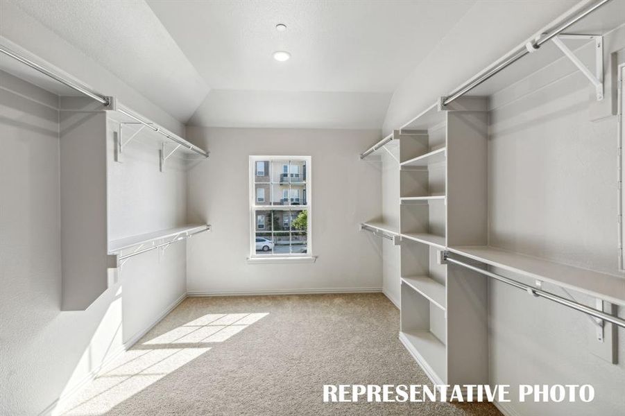 With space galore and filled with natural light, this amazing owner's closet is a dream come true!  REPRESENTATIVE PHOTO