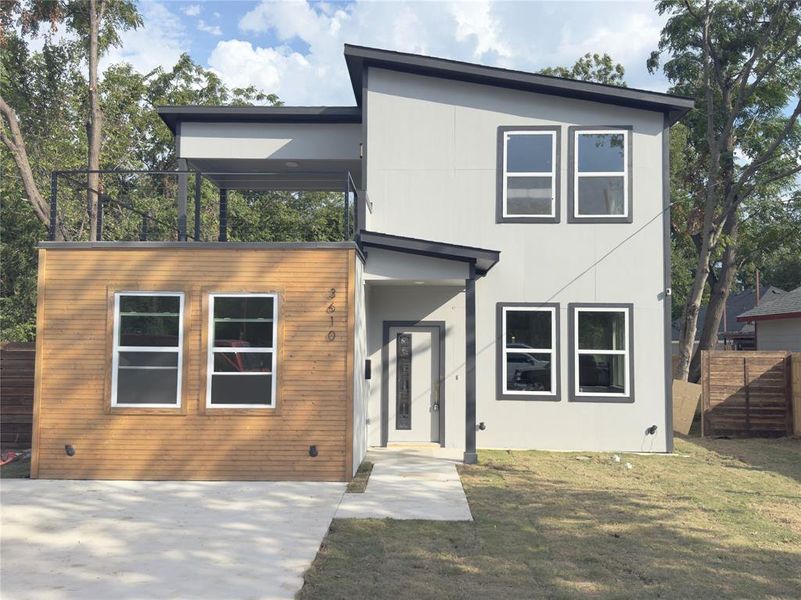 Modern home with a front yard