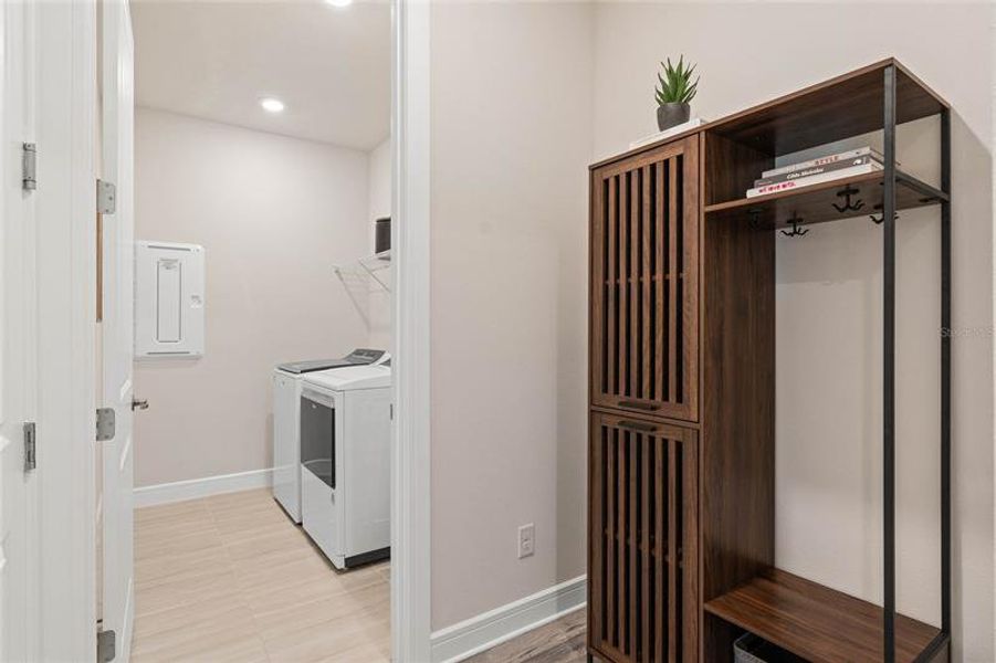 Laundry Room.  Model Home Design. Pictures are for illustrative purposes only. Elevations, colors and options may vary. Furniture is for model home staging only.