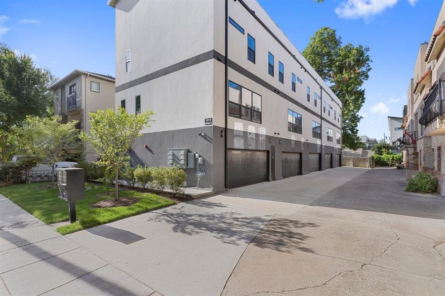 View of building exterior with a garage