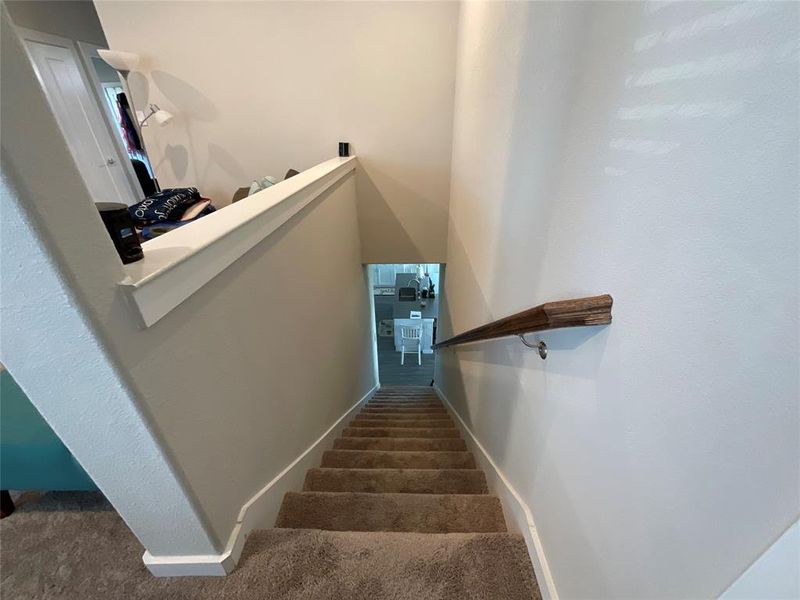 Staircase with carpet flooring