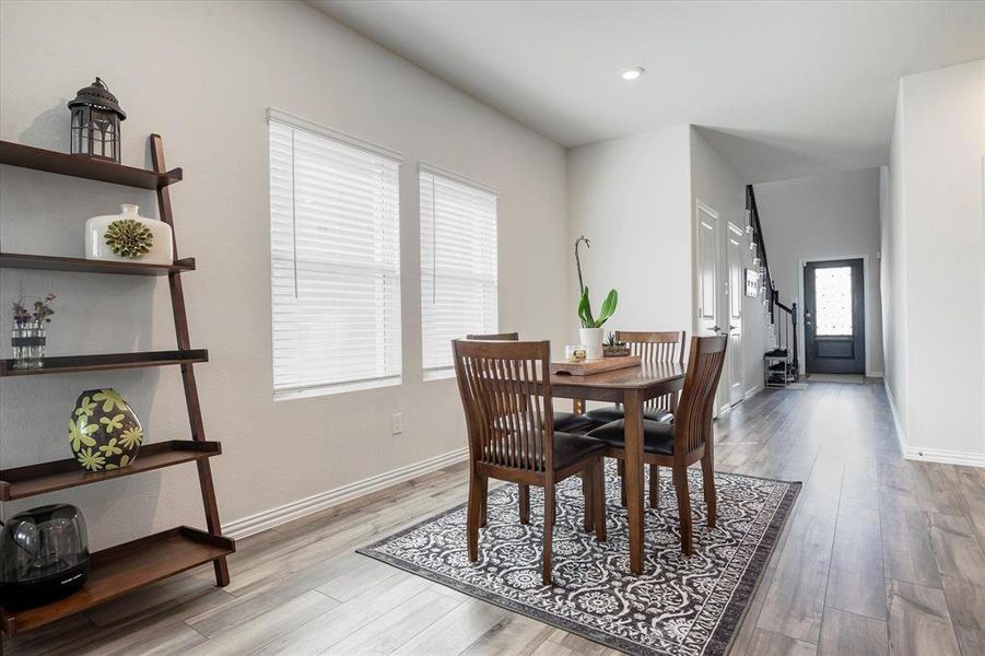 Dining room featuring light wood-type flooring