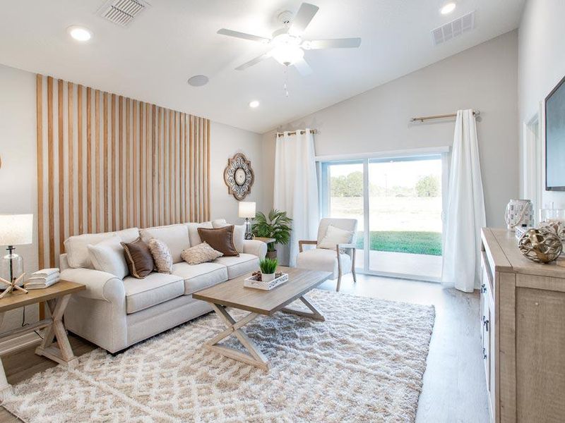 Modern, open-concept layout provides a spacious living area - Amaryllis home plan by Highland Homes