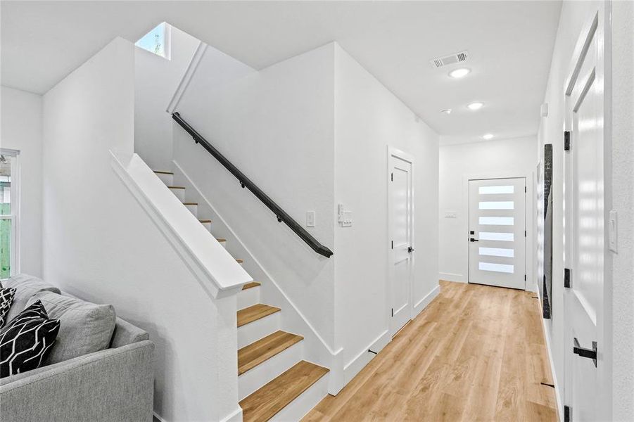 Entryway with light wood-type flooring