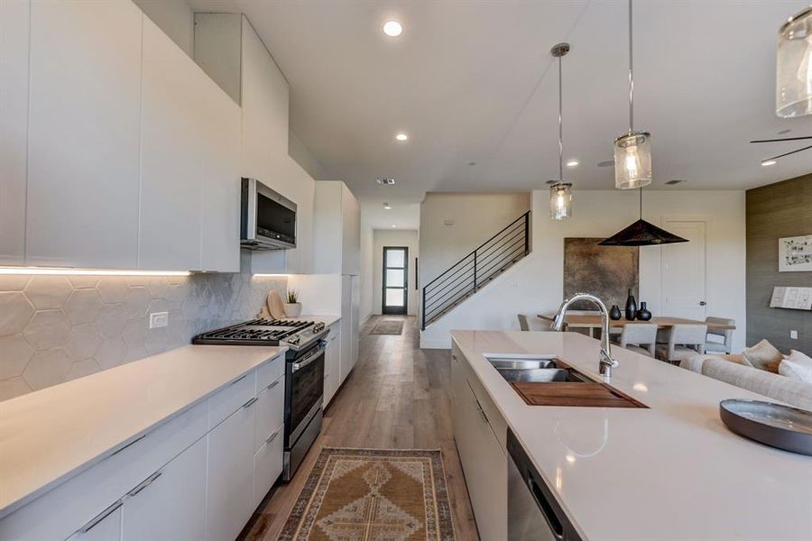 Front entry into kitchen. *Model Home*