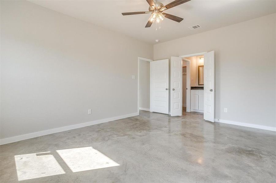 Unfurnished bedroom with ceiling fan