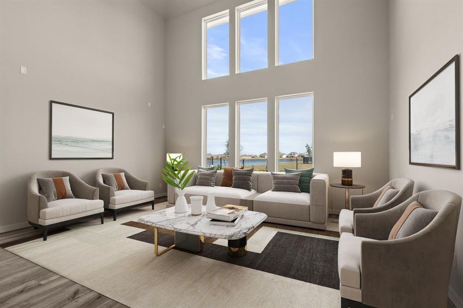 Your family room has ample space to entertain family and friends. This space features beautiful floors, fresh paint, ceiling fan with lighting, and high ceilings.