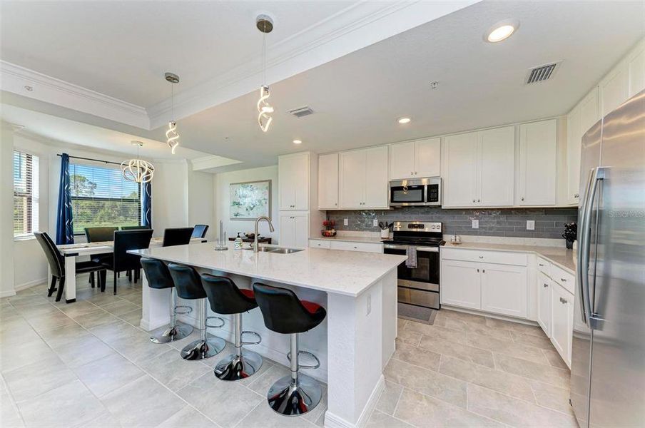 Upgraded tile backsplash added in Kitchen.