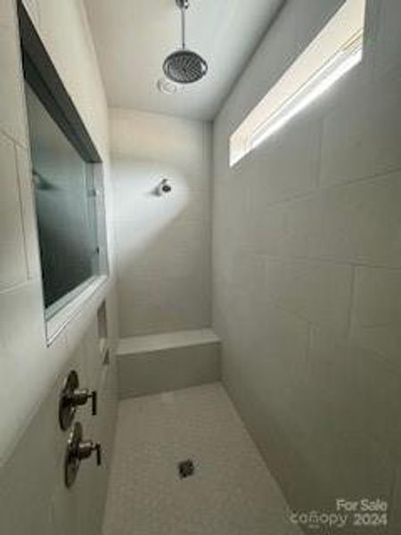 Large walk in shower in primary with rain head shower!