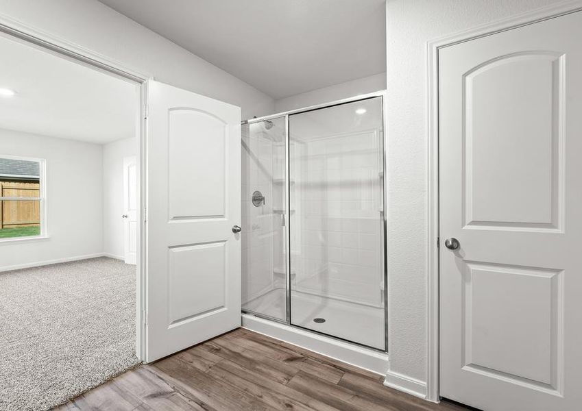 The master bathroom has a wonderful glass, walk-in shower.