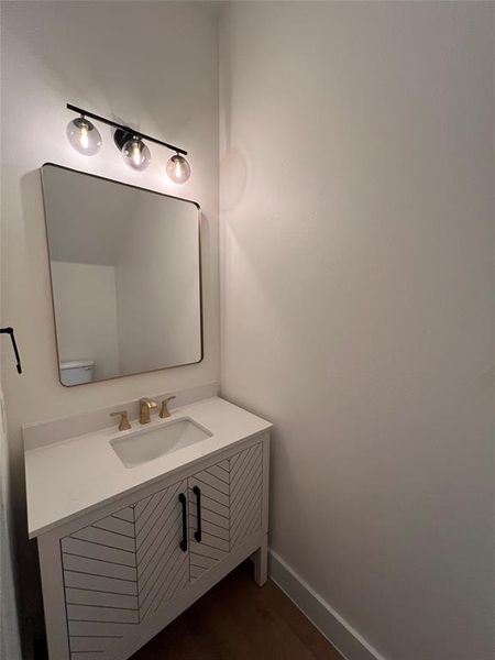 Bathroom with vanity and toilet