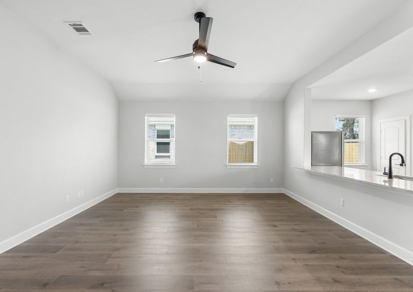 The family room of the Reed has two windows that let in great, natural light.