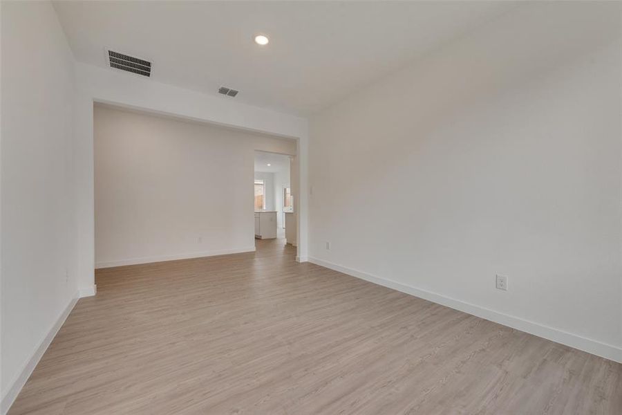 Spare room featuring light hardwood / wood-style floors