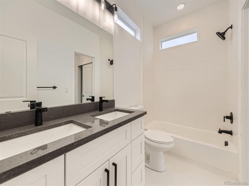 Upstairs bathroom shared by both bedrooms.