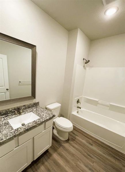 Bath 2 has granite counters & stylish framed mirror!