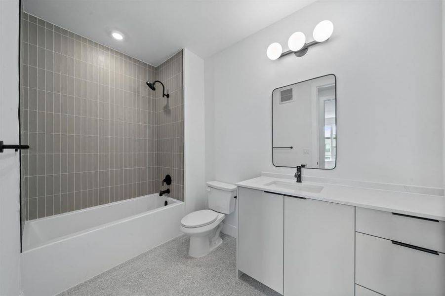 Cool finish scheme at Parkside at Mueller. *Photo to show finish-scheme only. Unit 307 has a frameless shower instead of tub/shower combo.*