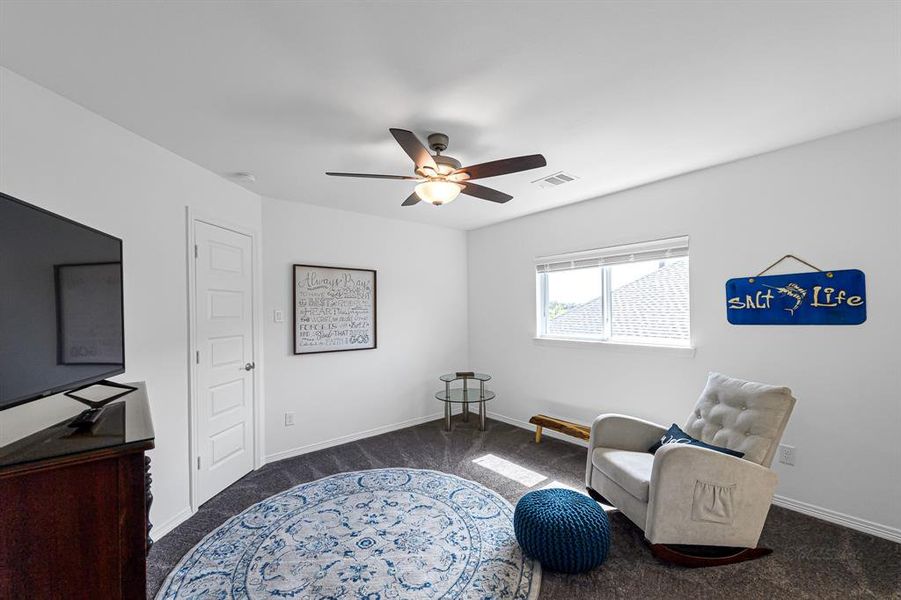 Secondary bedrooms feature ceiling fans, walk in closets and recent carpet!
