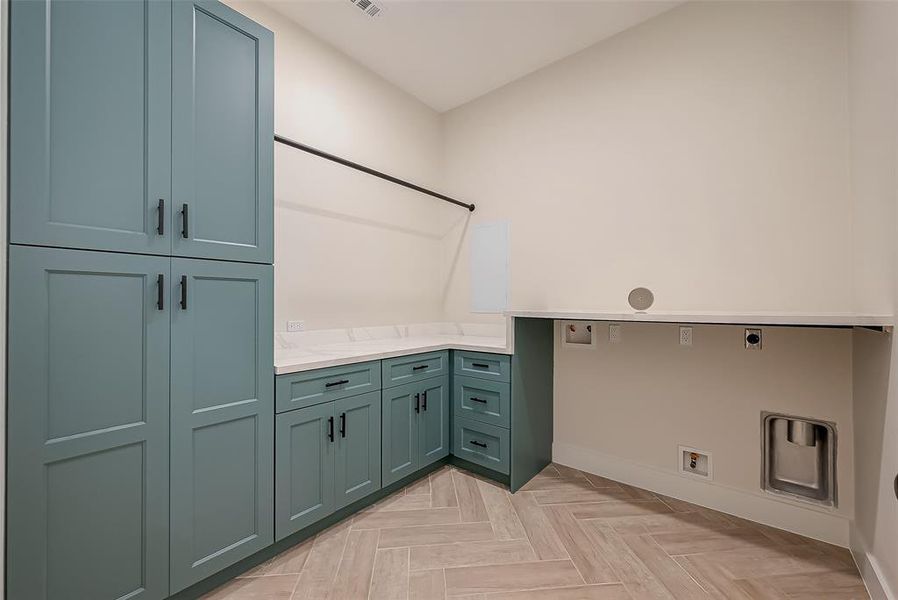 Your custom laundry room is equipped with storage for practical use