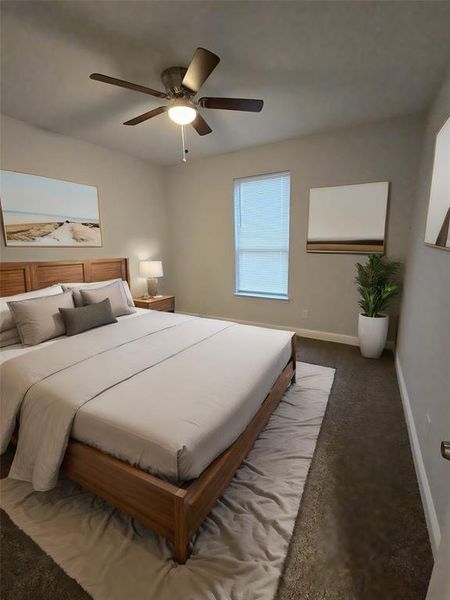 Bedroom with ceiling fan and carpet floors