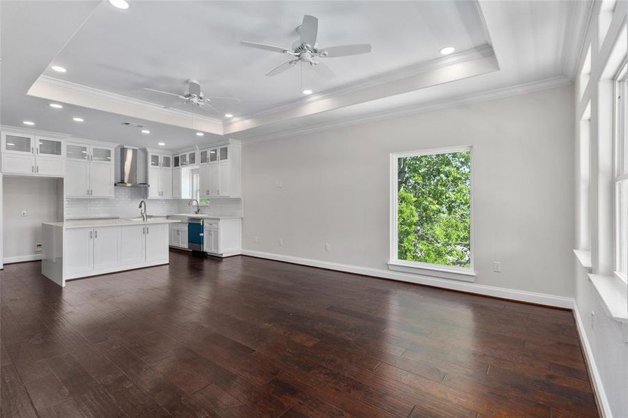 Family room upstairs with large window for natural lighting and water views