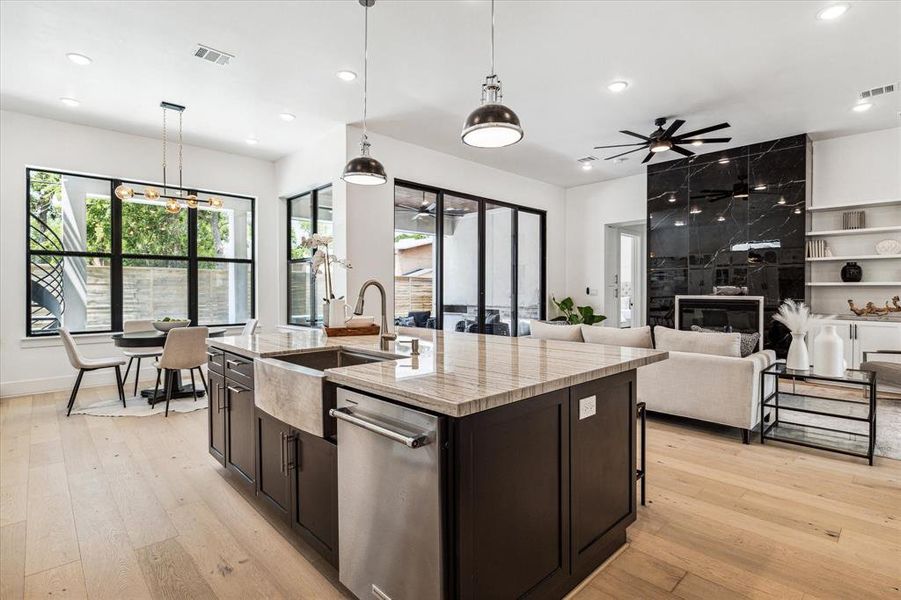 Talk about views! The backyard oasis is visible from the cozy breakfast nook, family room, and kitchen. Enjoy this seamless connection between indoor and outdoor living as you prepare meals with a picturesque backdrop.