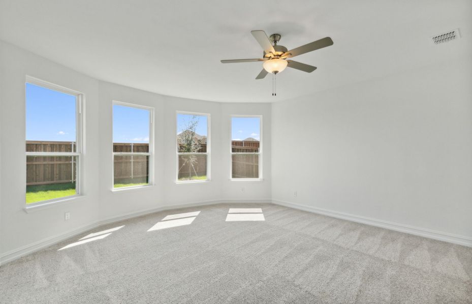 Elegant owner's suite with Bay window *real home pictured