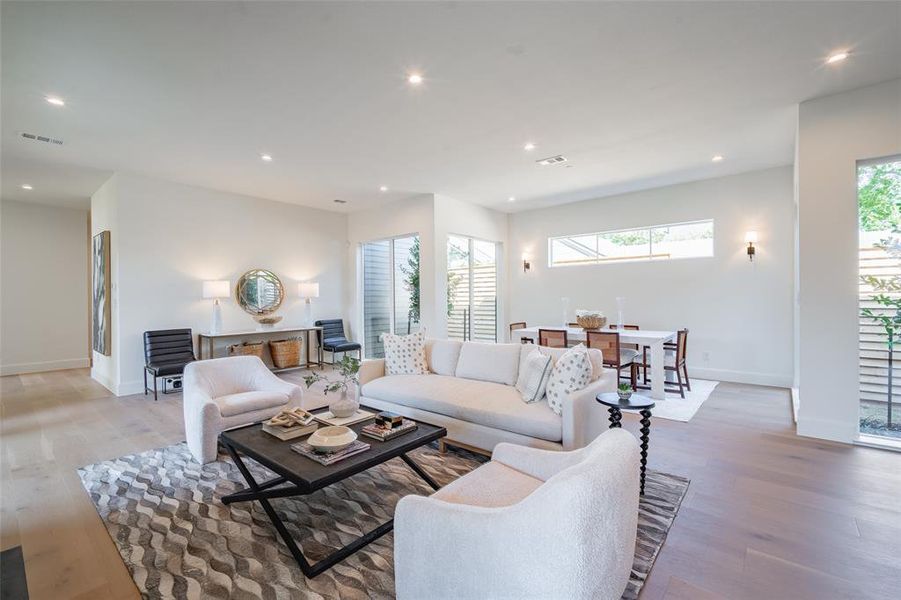 Living room with light wood-type flooring