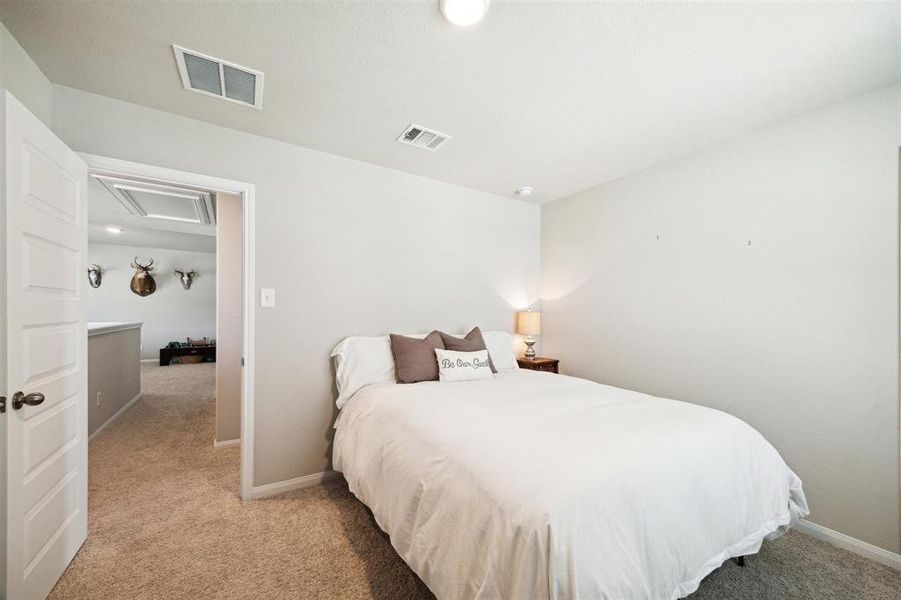 Another view of this delightful room. Just outside the door is the study loft.