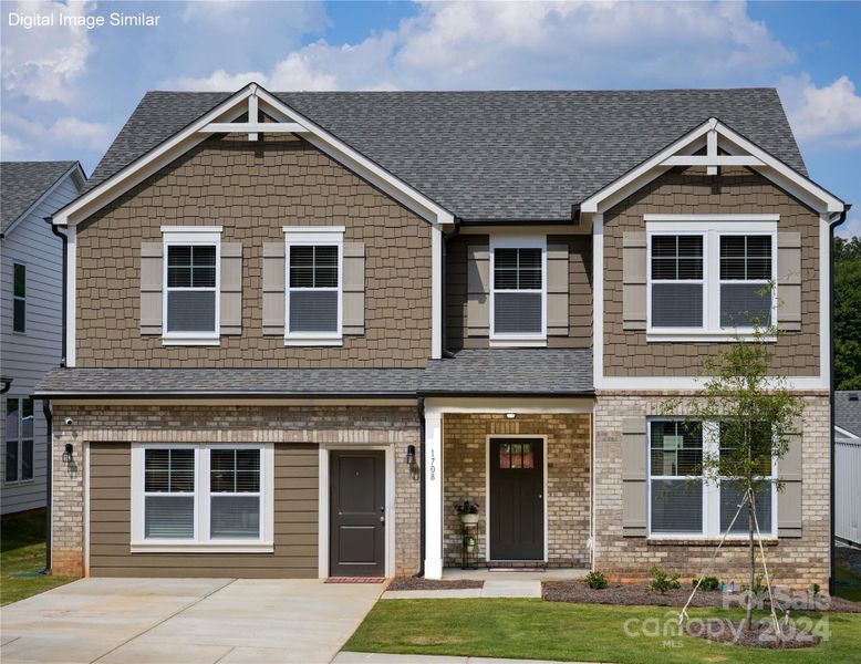 Digital Image Similar: Exterior has garage door