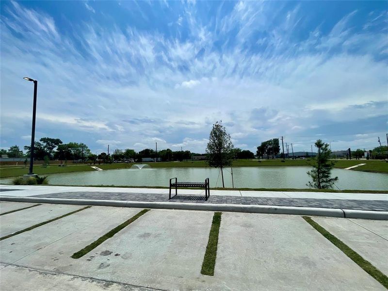 Enjoy a walk around the community pond or relax on a bench.