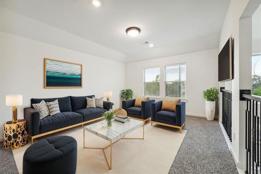 The bonus room on the upper level provides a flexible space that can be used as a second living area, a playroom, or a home office. Its open design and abundant light make it a welcoming retreat.