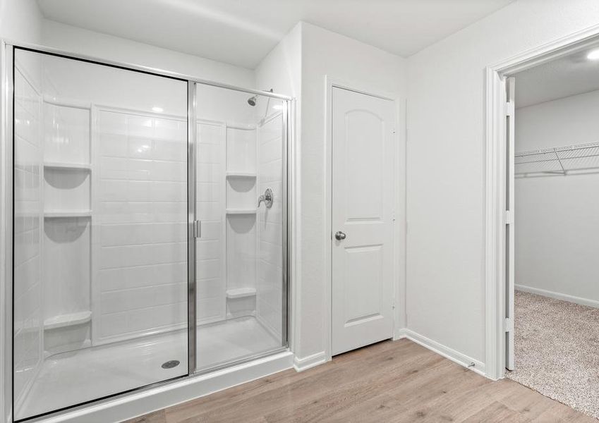 The master bathroom of the Blanco has a large walk-in, glass shower.