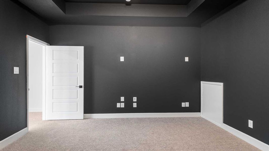 Unfurnished room with carpet floors