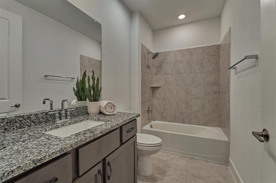 Lovely secondary bath with large vanity & mirror!